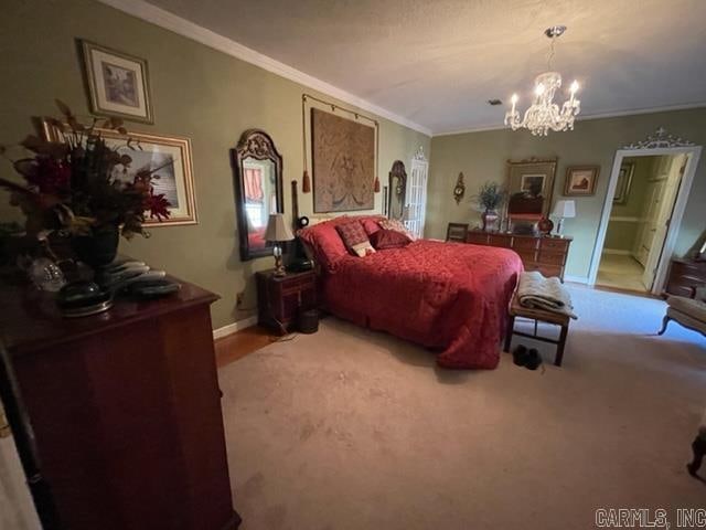 bedroom featuring an inviting chandelier, crown molding, and carpet floors