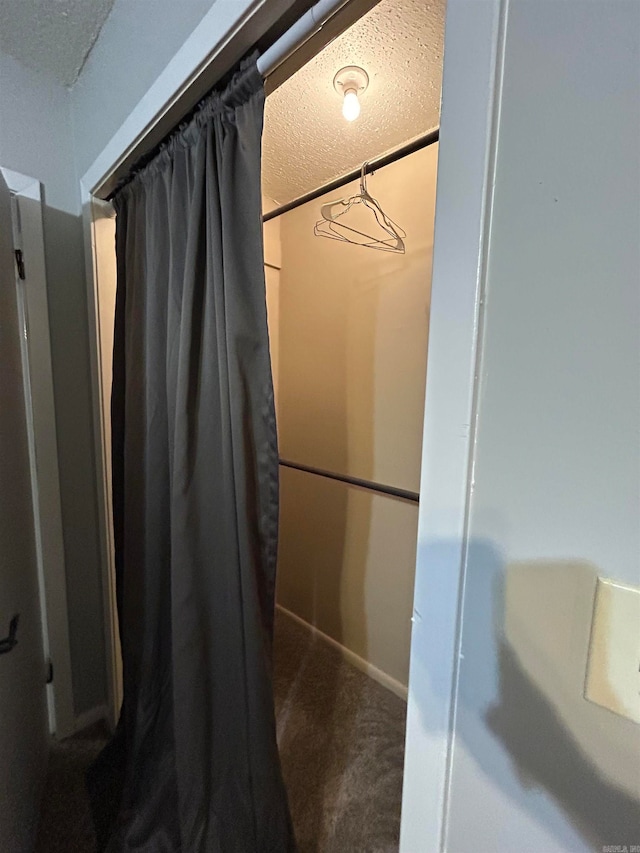 bathroom featuring a textured ceiling