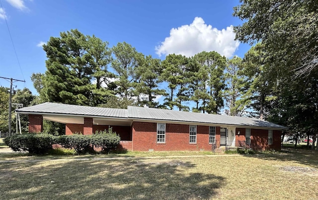 single story home with a front yard
