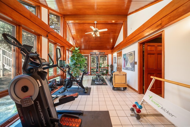 exercise area with ceiling fan, plenty of natural light, and light tile flooring