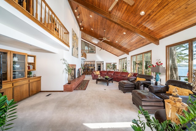 living room with light carpet, high vaulted ceiling, and ceiling fan