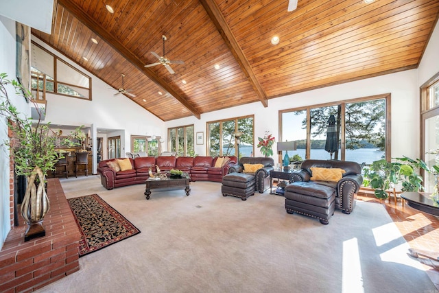 living room featuring light carpet, beamed ceiling, ceiling fan, high vaulted ceiling, and wood ceiling