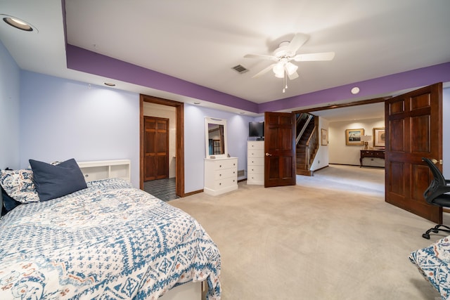 carpeted bedroom featuring ceiling fan