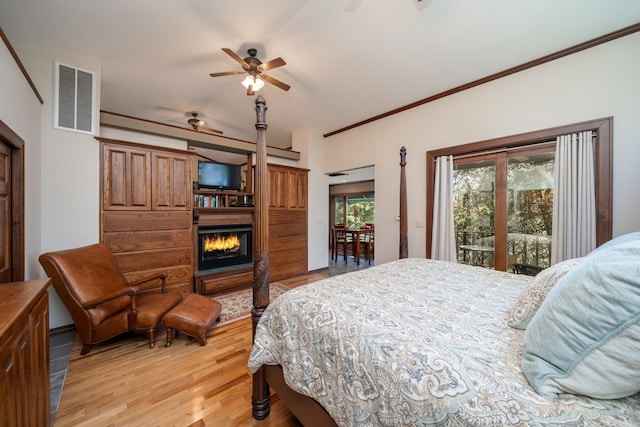 bedroom featuring crown molding, access to exterior, ceiling fan, and light hardwood / wood-style flooring