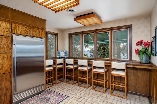 kitchen with stainless steel built in fridge