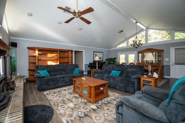 living room featuring high vaulted ceiling, french doors, ceiling fan with notable chandelier, crown molding, and dark hardwood / wood-style flooring