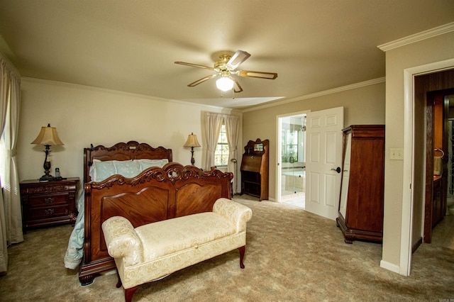 bedroom with dark carpet, ornamental molding, ceiling fan, and ensuite bathroom