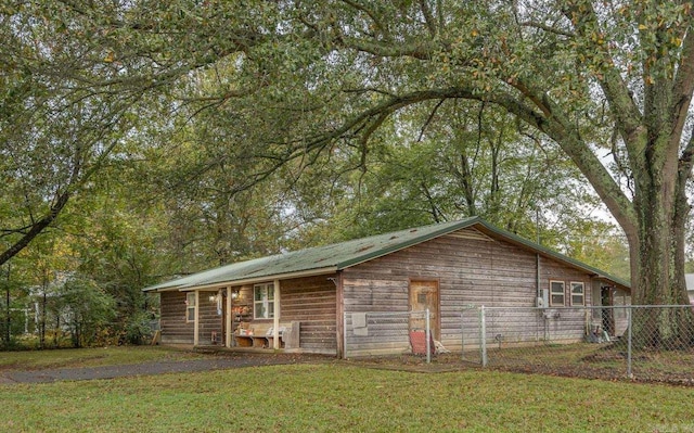 exterior space featuring a front lawn