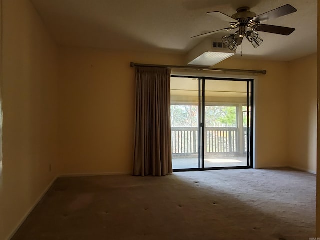 empty room with carpet flooring and ceiling fan