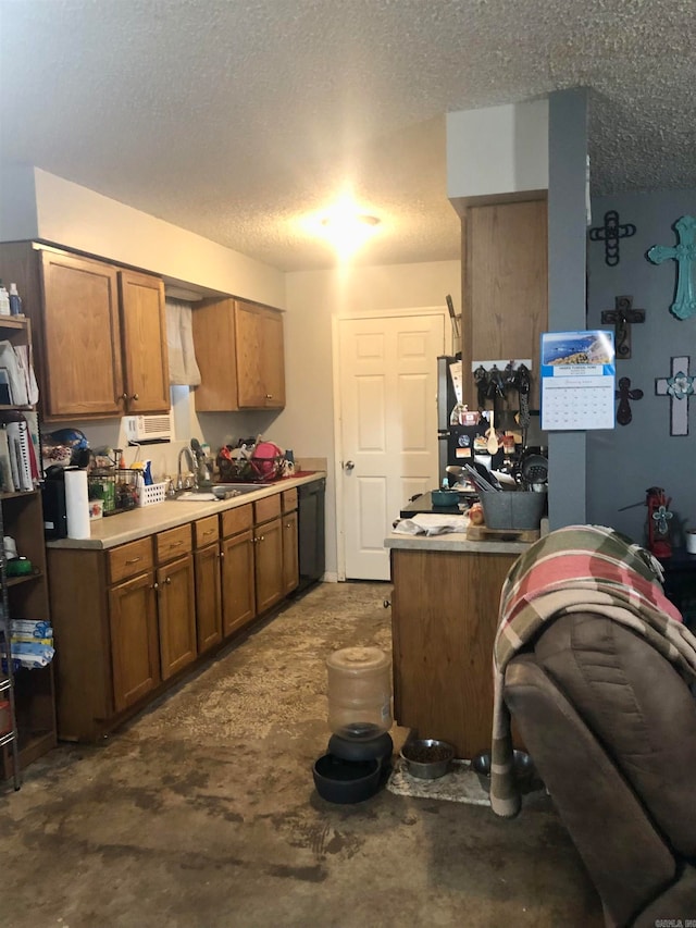 kitchen with a textured ceiling and sink