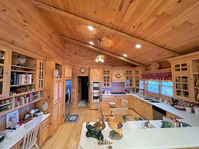 kitchen featuring appliances with stainless steel finishes, lofted ceiling with beams, wooden ceiling, light hardwood / wood-style floors, and hanging light fixtures