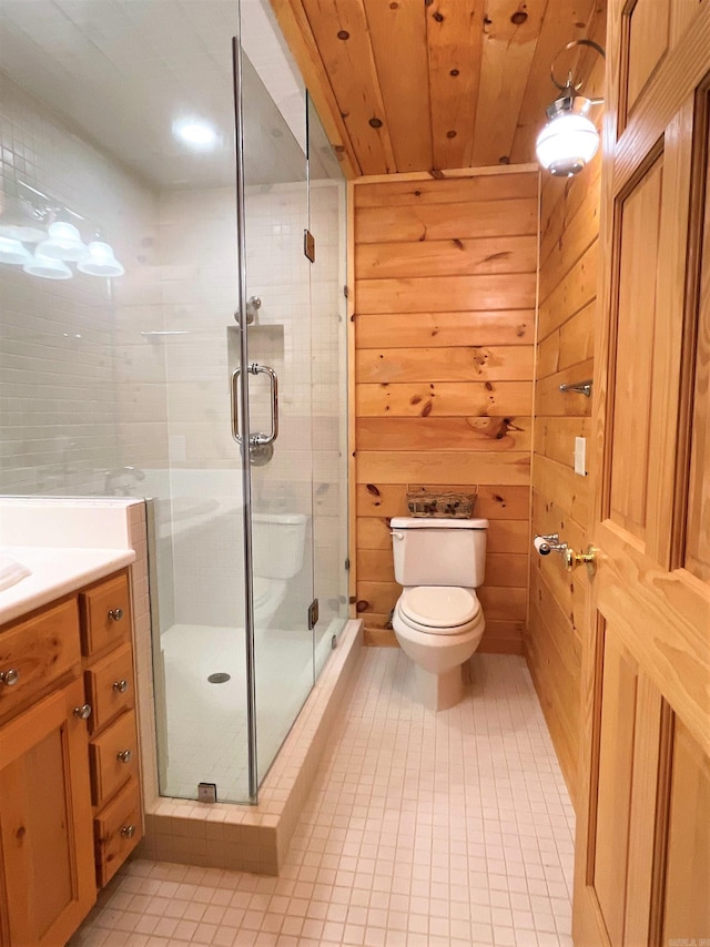 bathroom with an enclosed shower, vanity, wooden walls, wooden ceiling, and toilet