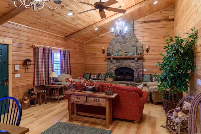 living room with wooden ceiling, wooden walls, light hardwood / wood-style flooring, a fireplace, and beam ceiling