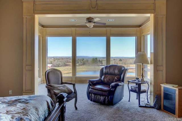 bedroom with ceiling fan and carpet