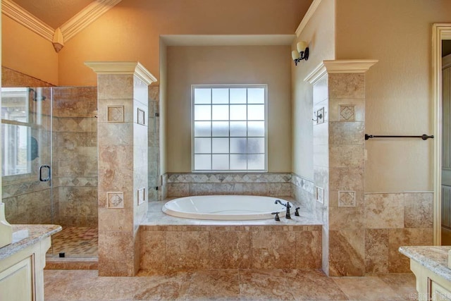 bathroom with crown molding, plenty of natural light, vanity, and shower with separate bathtub