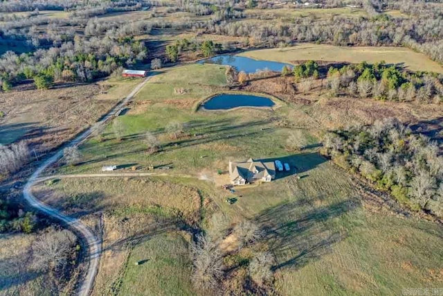 bird's eye view featuring a water view and a rural view