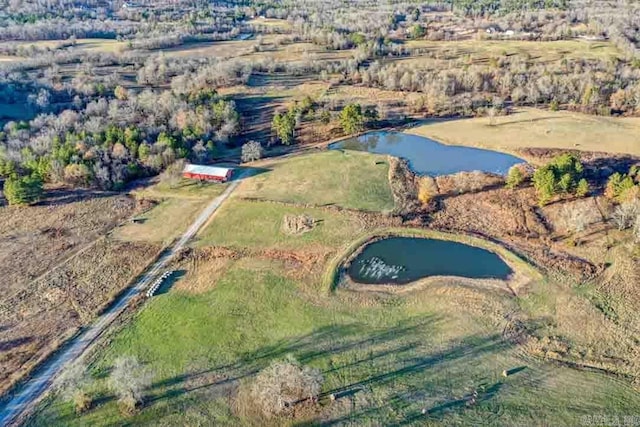 aerial view with a water view and a rural view