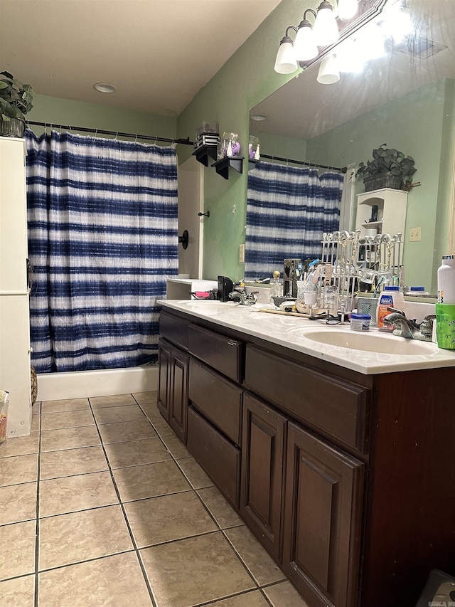 bathroom with vanity, tile patterned flooring, and a shower with curtain