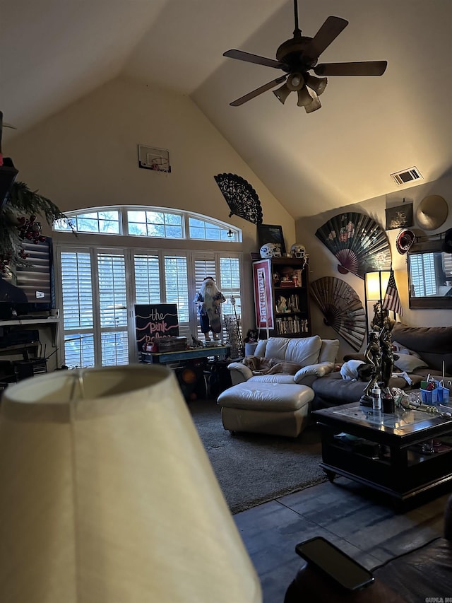 living room with high vaulted ceiling and ceiling fan