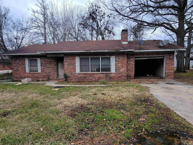 single story home with a garage