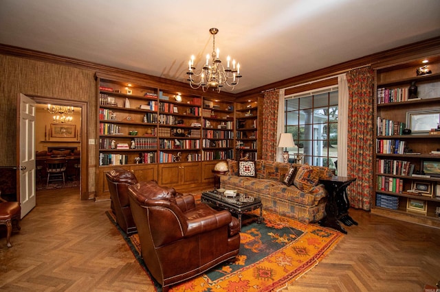 sitting room featuring a notable chandelier, parquet flooring, and built in shelves