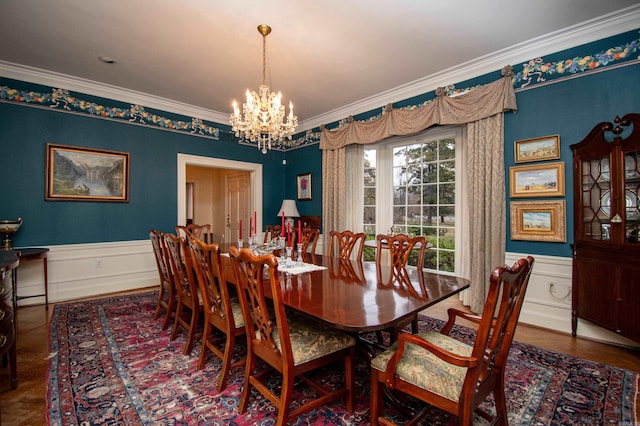 dining room with ornamental molding and an inviting chandelier