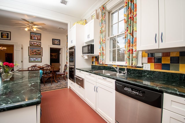 kitchen featuring ceiling fan, stainless steel appliances, white cabinets, crown molding, and sink