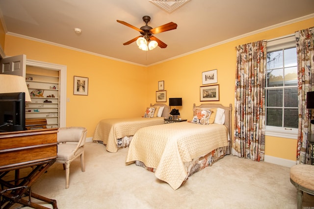 bedroom with carpet floors, ceiling fan, and ornamental molding