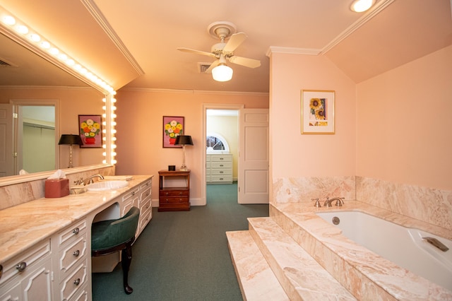 bathroom with vanity, crown molding, ceiling fan, and tiled bath