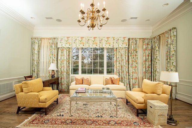 interior space with ornamental molding, hardwood / wood-style floors, and a chandelier