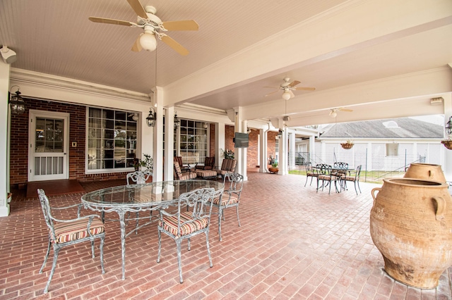 view of patio / terrace featuring ceiling fan