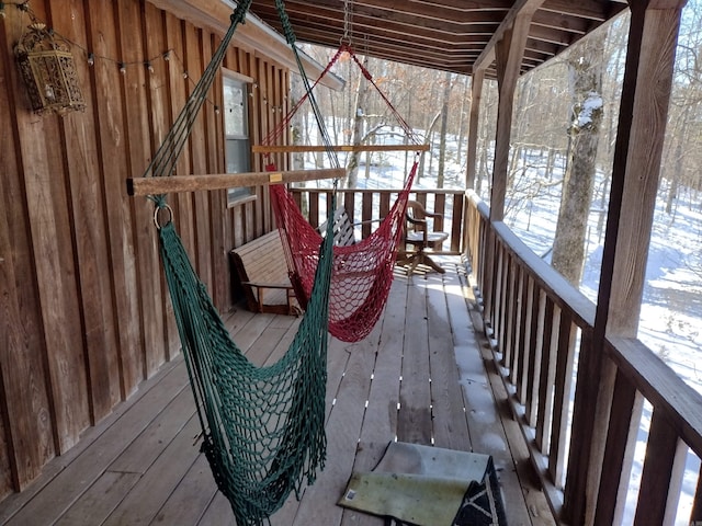 view of snow covered deck