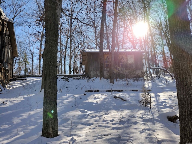 view of yard covered in snow