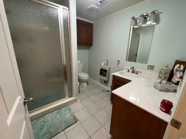 bathroom with tile floors, a shower with door, toilet, vanity, and crown molding