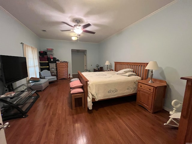 bedroom with ceiling fan and dark wood-type flooring