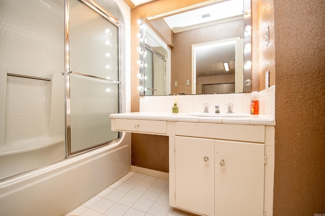 bathroom featuring tile floors, shower / bath combination with glass door, and oversized vanity