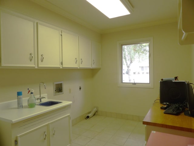 laundry room featuring washer hookup, sink, hookup for an electric dryer, cabinets, and crown molding