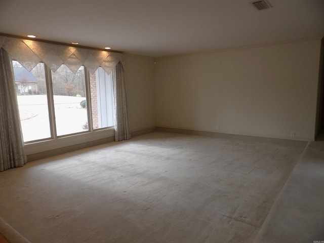 view of carpeted spare room