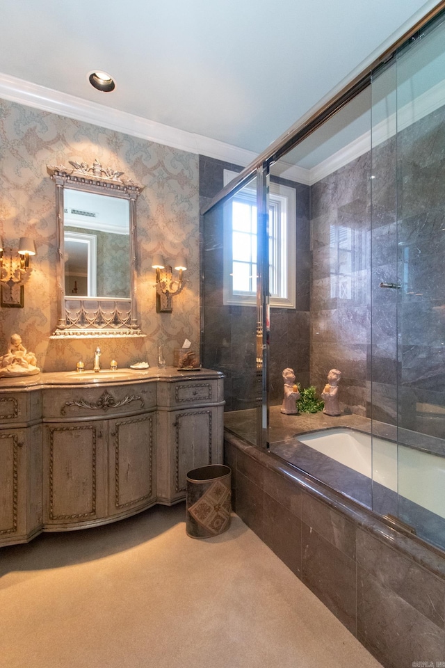 bathroom with tile walls, ornamental molding, and vanity