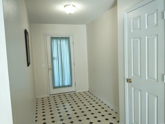 entryway featuring light tile flooring