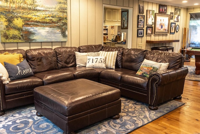 living room featuring billiards and hardwood / wood-style flooring