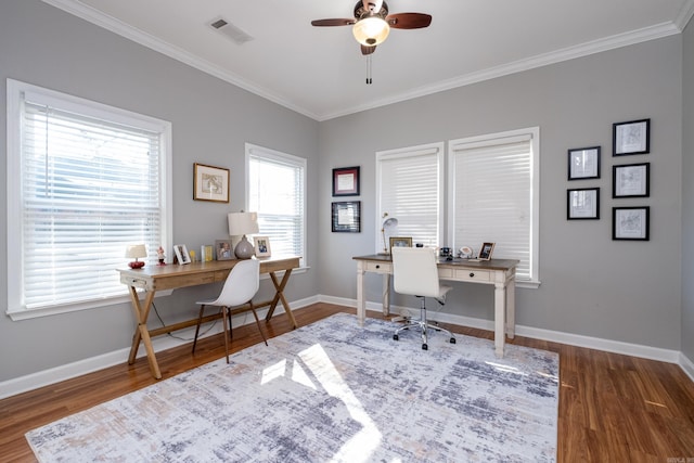 office space featuring dark hardwood / wood-style floors, ceiling fan, and ornamental molding