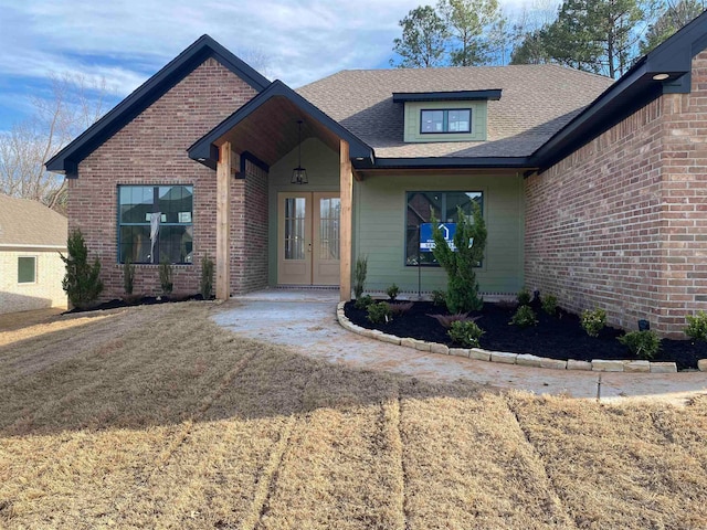 view of front of property featuring covered porch