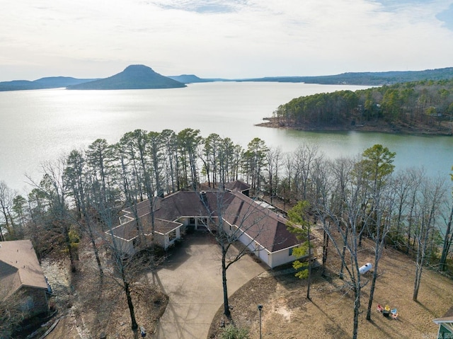 bird's eye view featuring a water and mountain view