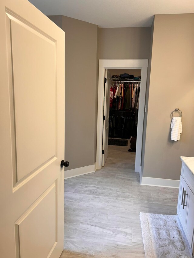 bathroom with vanity and hardwood / wood-style flooring