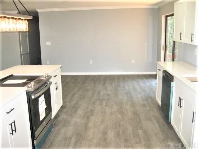 kitchen with electric stove, white cabinets, ornamental molding, and dark hardwood / wood-style flooring