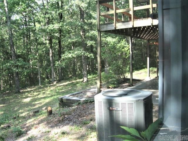 view of yard with central AC unit