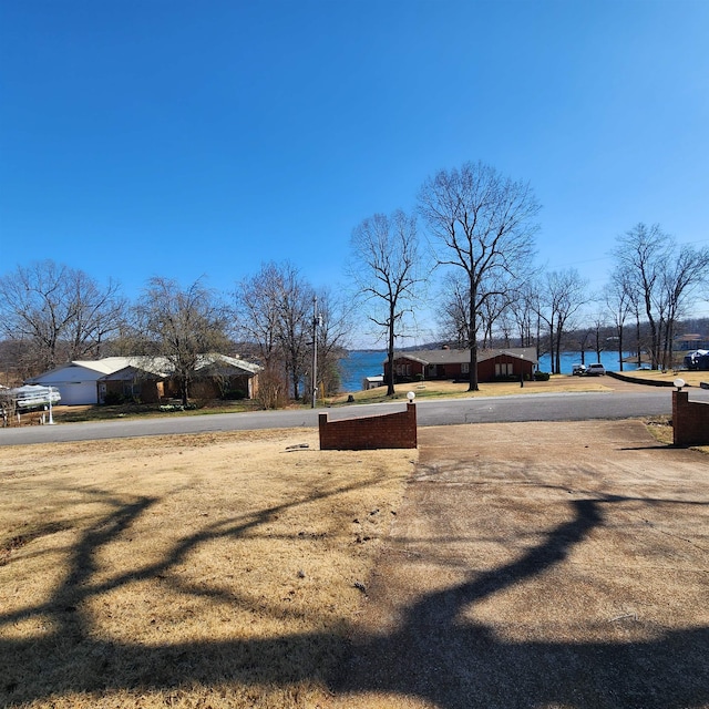 view of yard with a water view