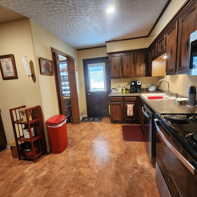 kitchen with dark brown cabinetry, stainless steel dishwasher, light tile floors, electric stove, and sink