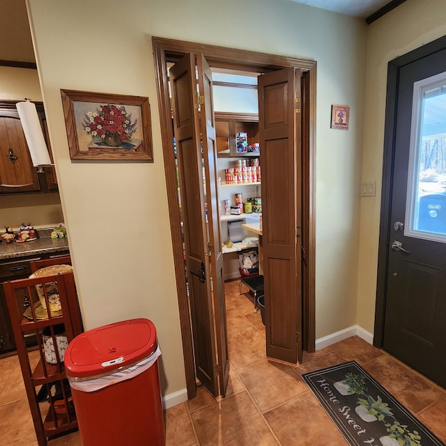 hallway with light tile floors